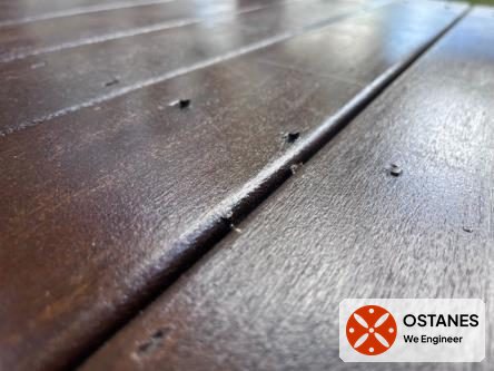 Proud nail heads on timber balcony decking boards